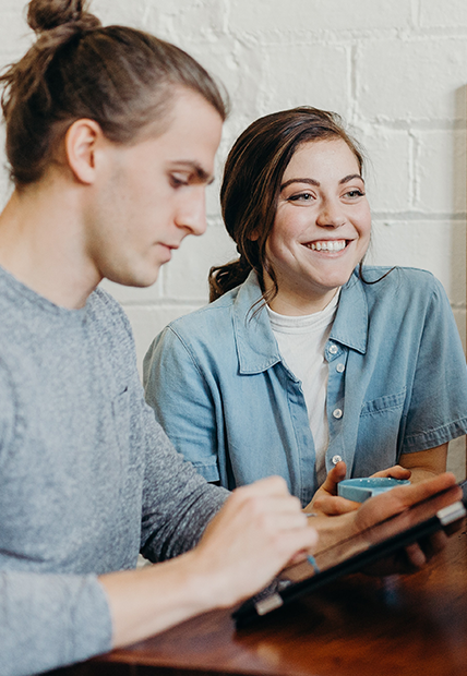 University students smile - as native help brands to authentically connect with young people.